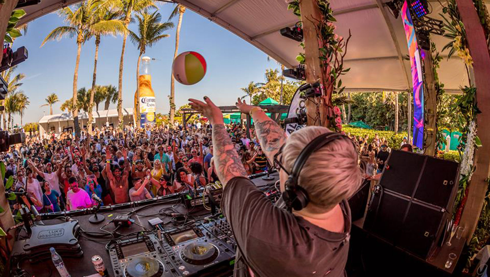 DJ performing for large crowd